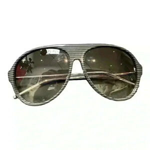 RAF  Simon’s collaboration with Linda Farrow Sunglasses